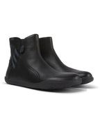 STIEFELETTE I PEU CAMI