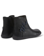 STIEFELETTE I PEU CAMI